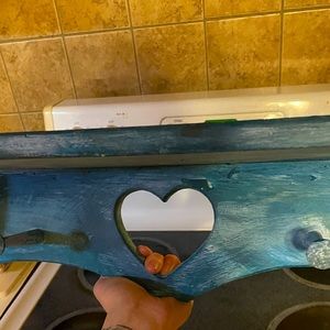 Painted primitive shelf with hooks